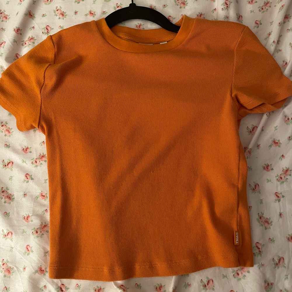 TNA baby tee